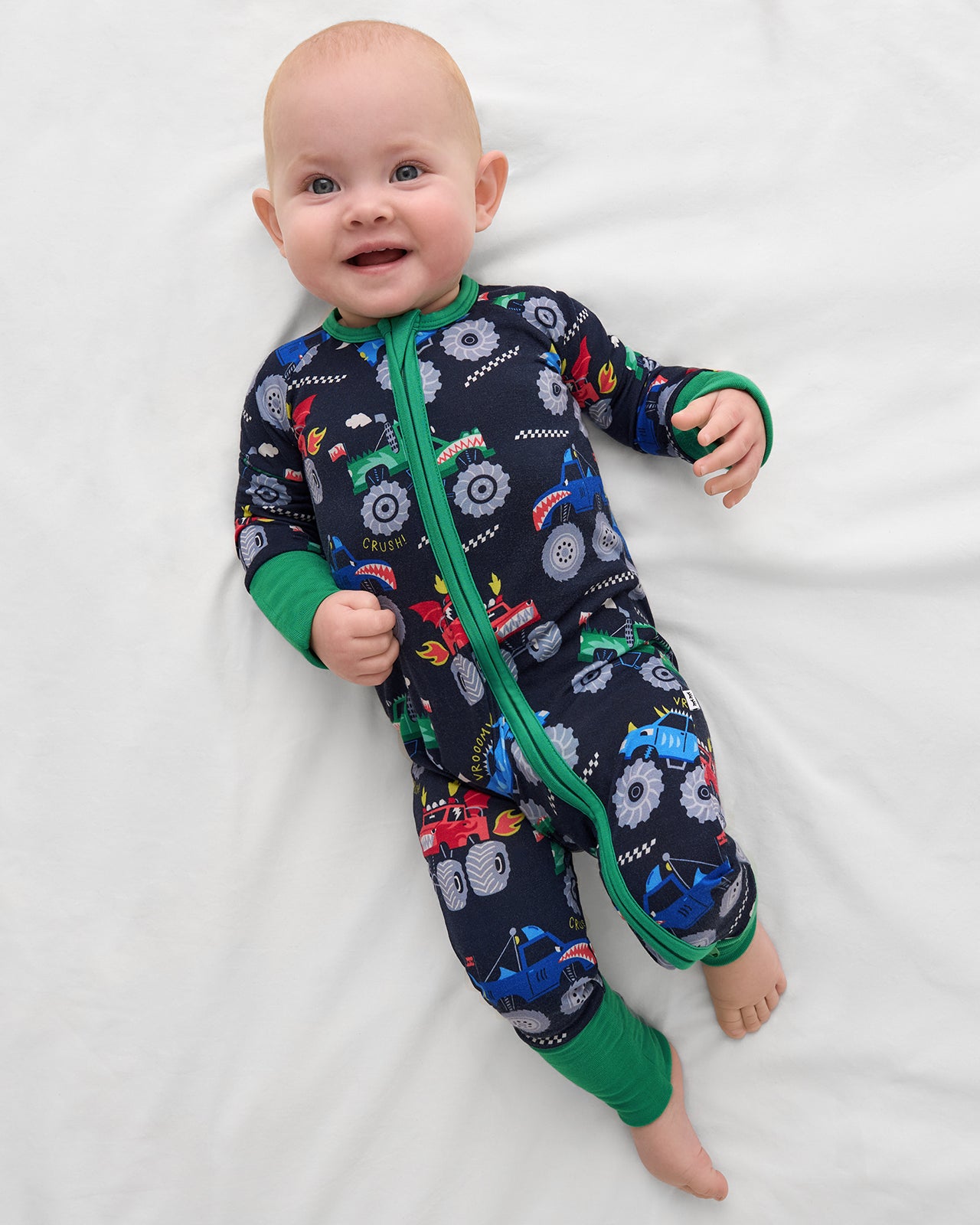 Aerial view of baby wearing the Monster Truck Madness Zippy