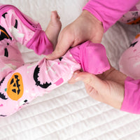 Alternative top view close up image of foot fold over detail on a Pink Glowing Ghouls Zippy