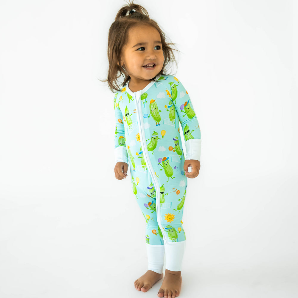 Child standing wearing the Pickle Power Zippy