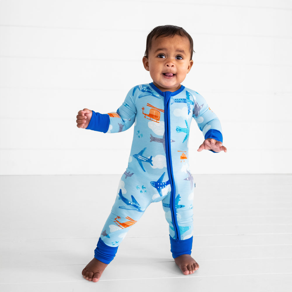 image of a child wearing a Let's Fly zippy