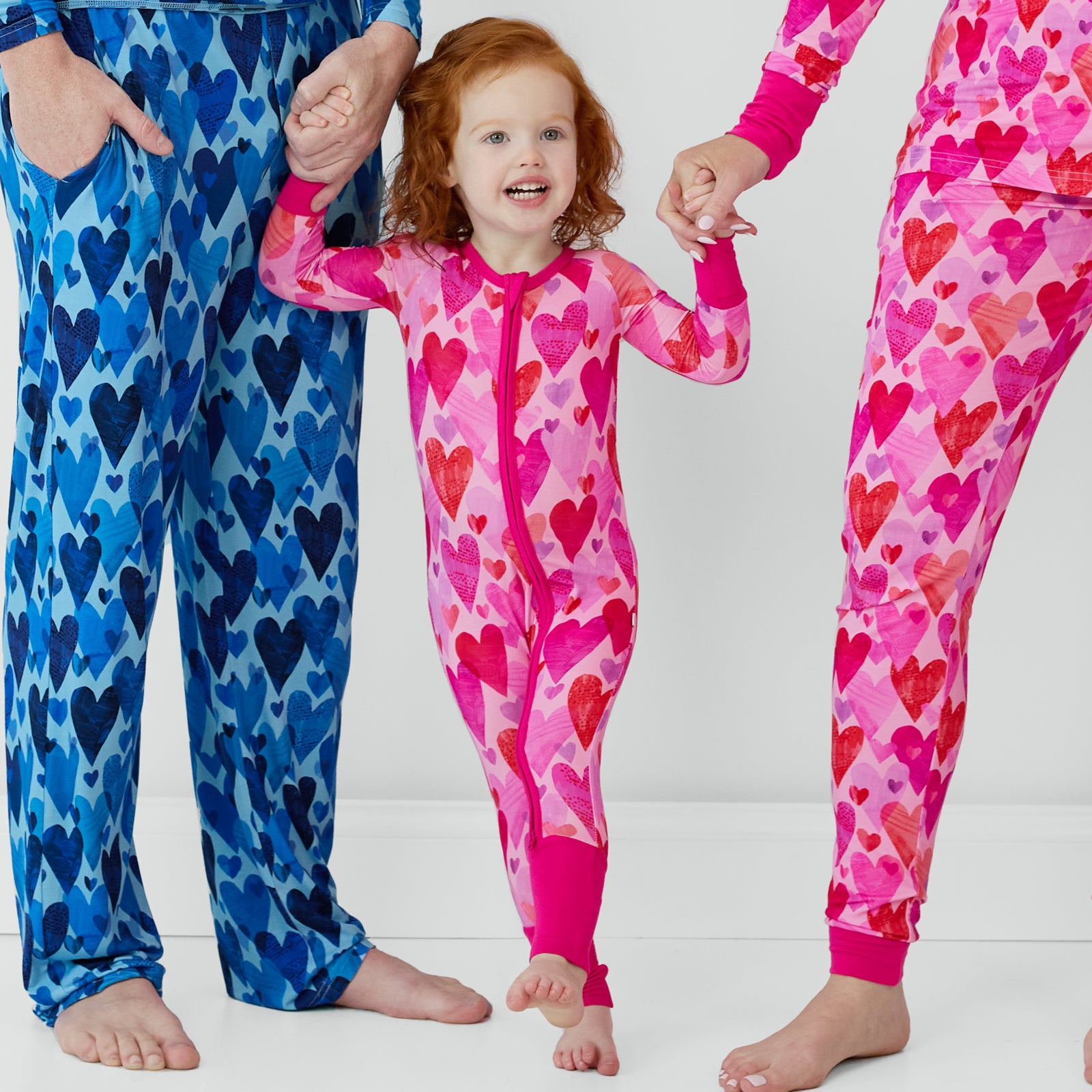 Family coordinating pajamas in Hearts & Crafts in blue and pink.