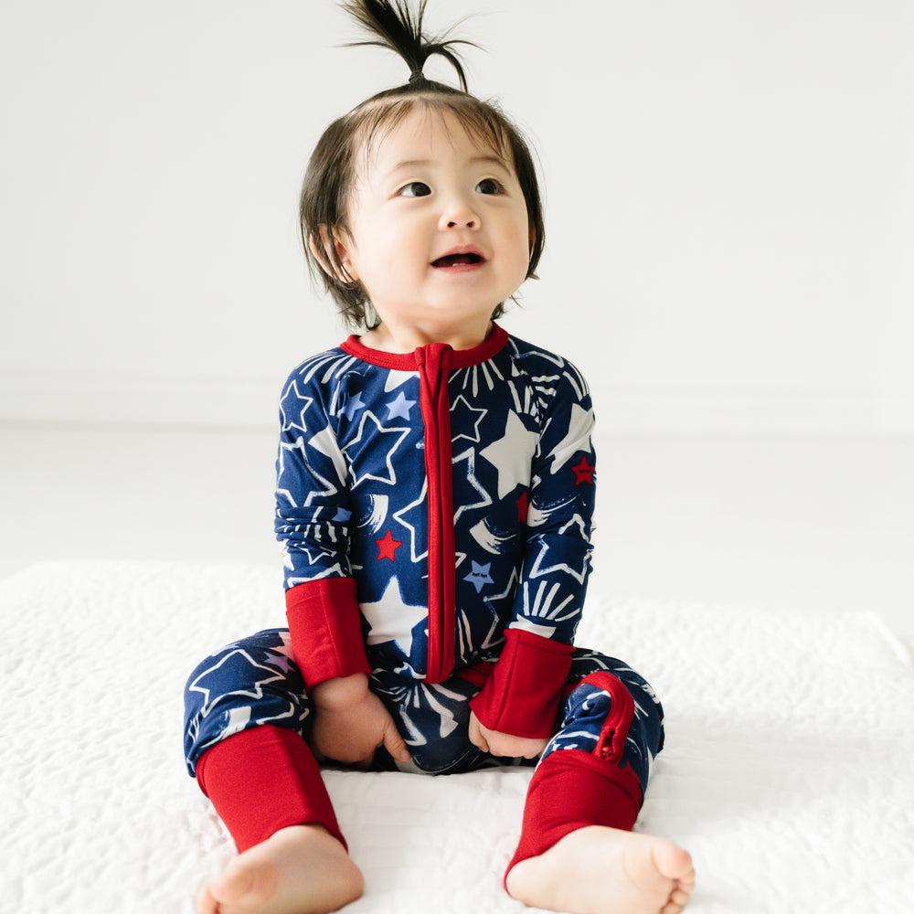 Alternate image of a child sitting wearing a Star Spangled zippy