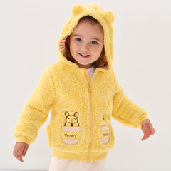 Close up image of a child wearing a Disney Winnie the Pooh sherpa zip hoodie with the hood up