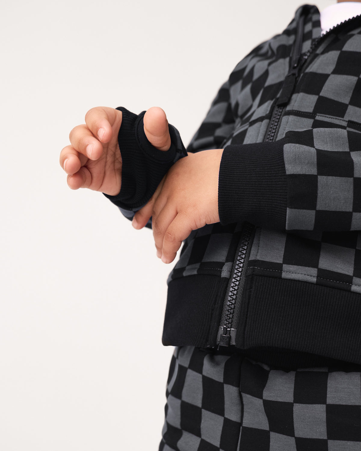 Close up of the wrist cuffs on the Monochrome Checks Zip Hoodie