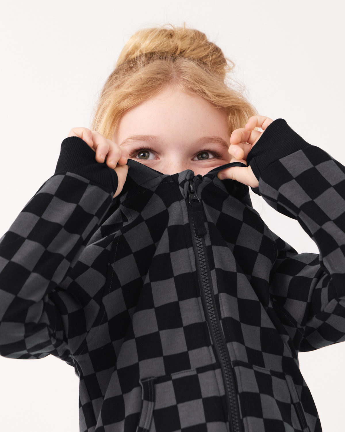 Close up of girl wearing the Monochrome Checks Zip Hoodie