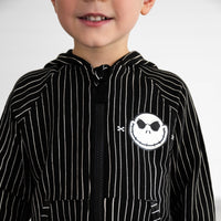 Close up image of boy wearing the Disney Jack Skellington Zip Hoodie