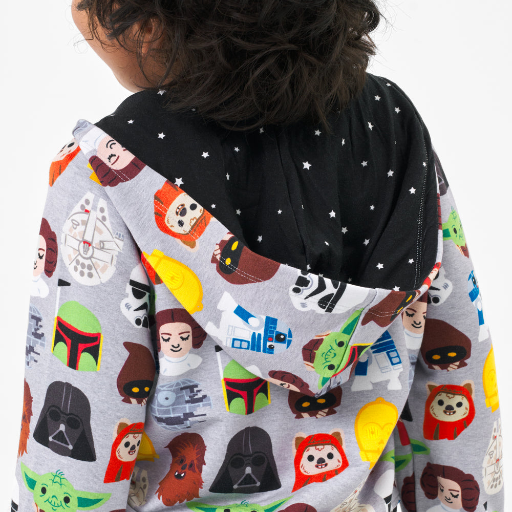 Back view image of a child wearing a Legends of the Galaxy zip hoodie, detailing the inner lining of the hood