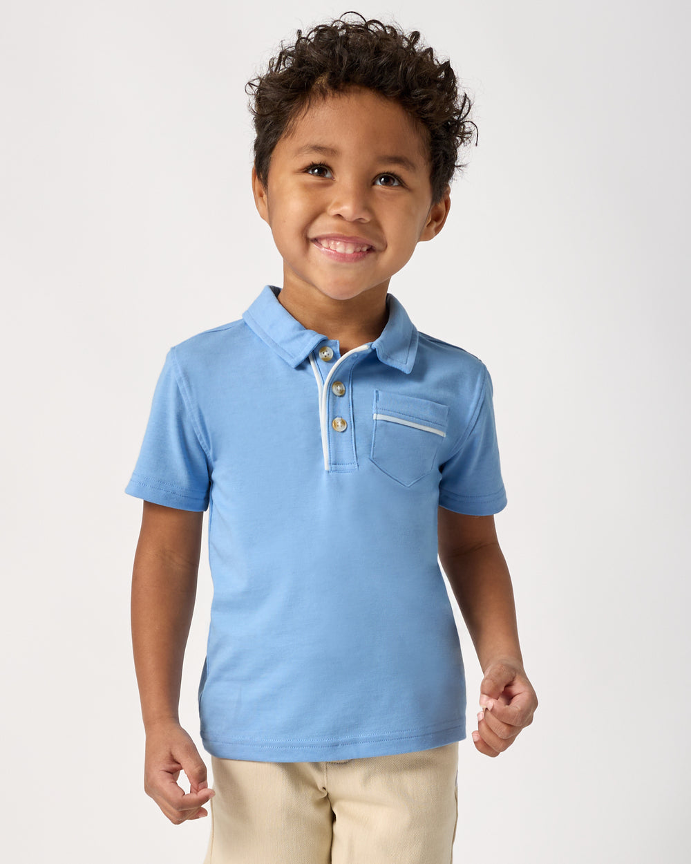 Boy wearing the Lakeside Blue Polo Shirt