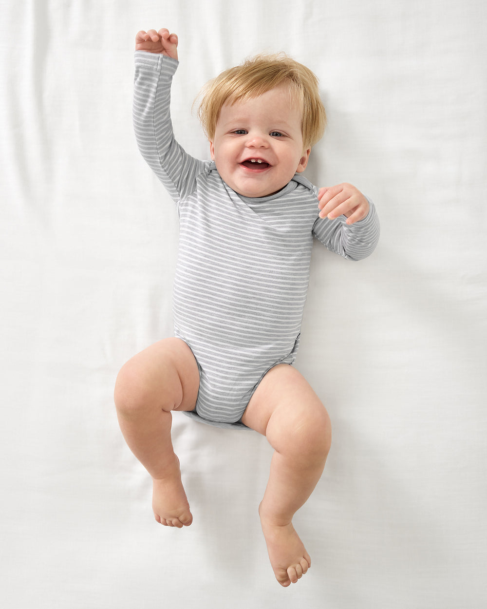 Aerial view of baby wearing the Light Heather Gray Stripe Bodysuit