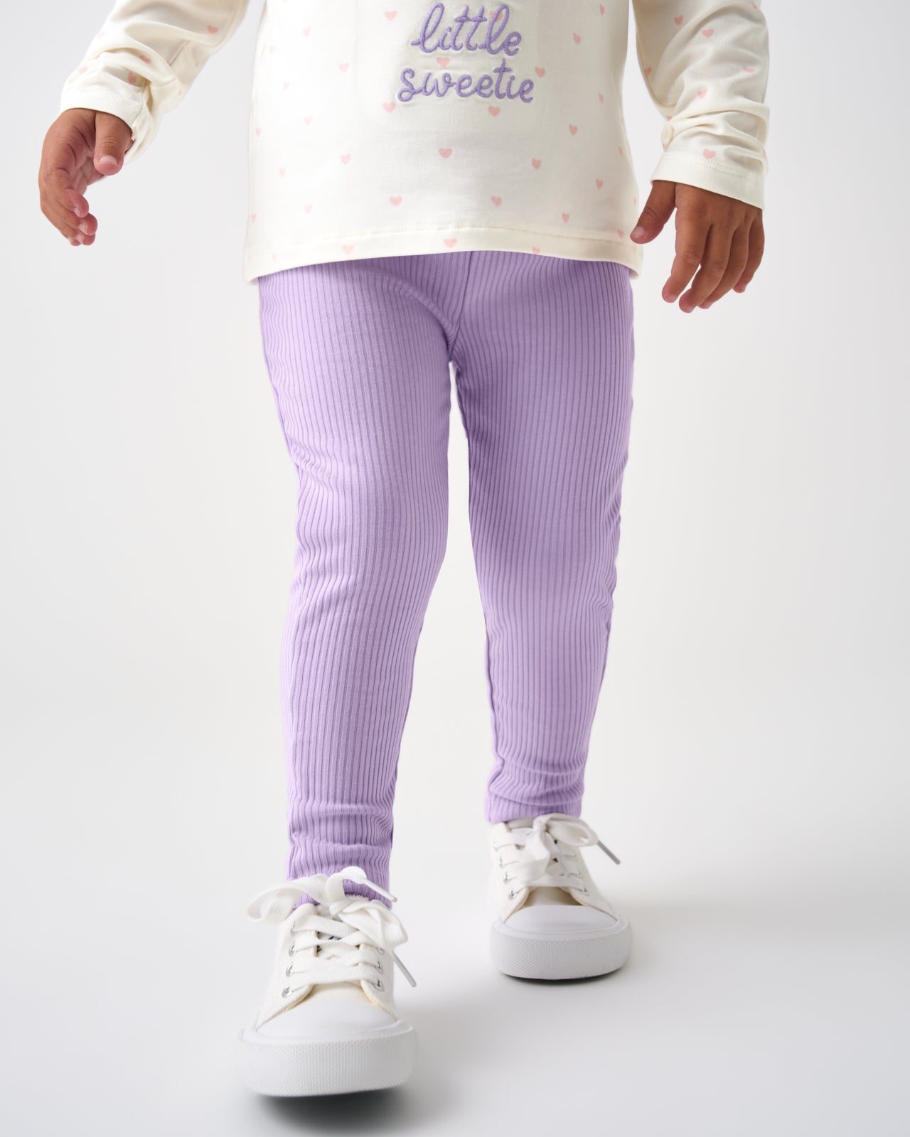 Close up of girl wearing the Lilac Haze Ribbed Legging