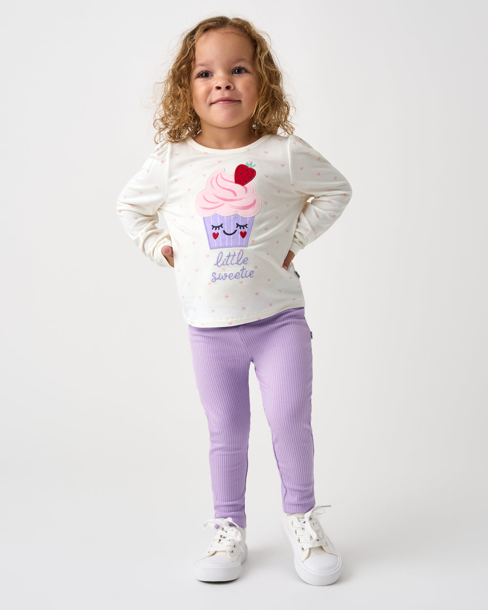 Standing girl wearing the Lilac Haze Ribbed Legging