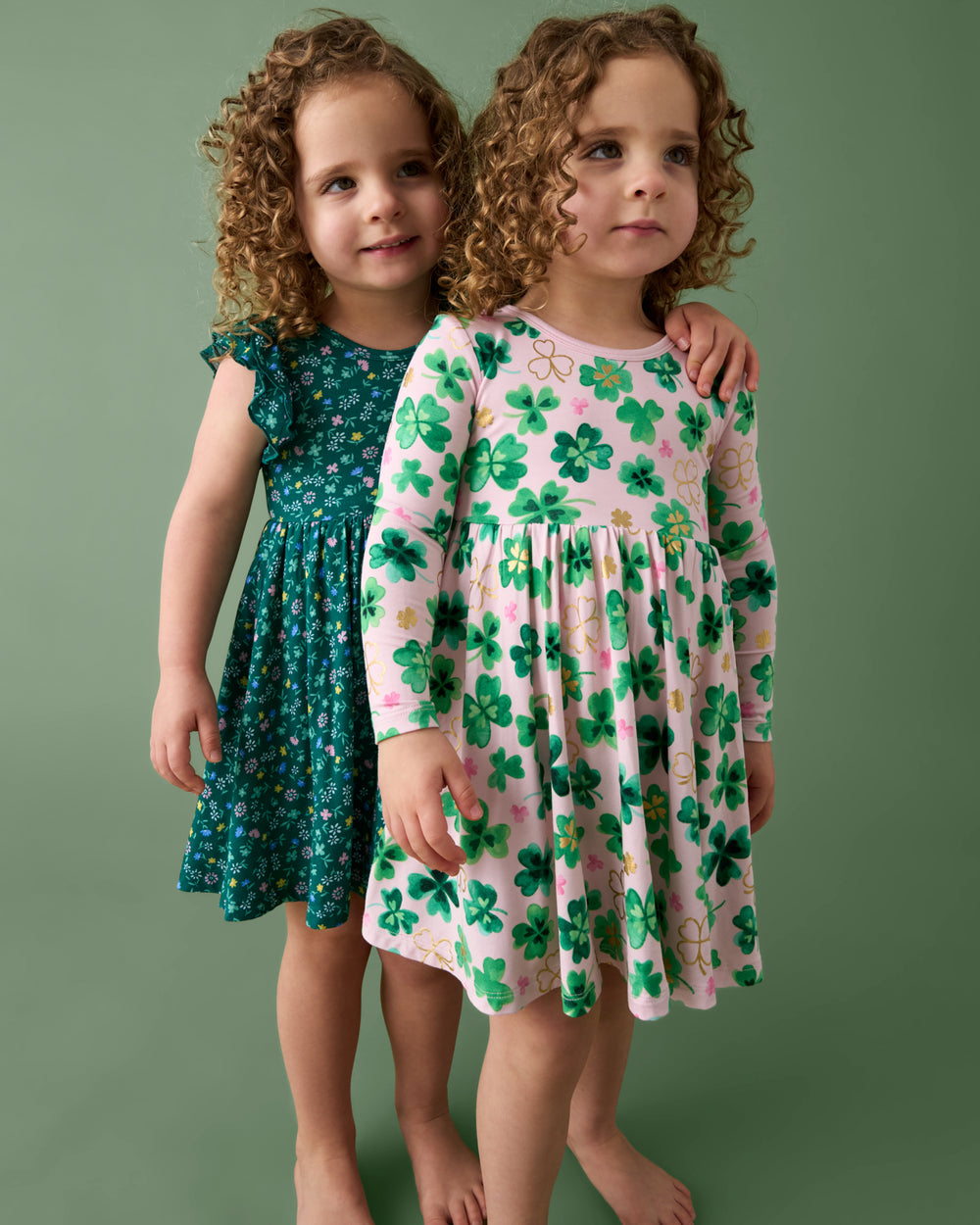 Two girls wearing dresses from the St Patricks Day collection
