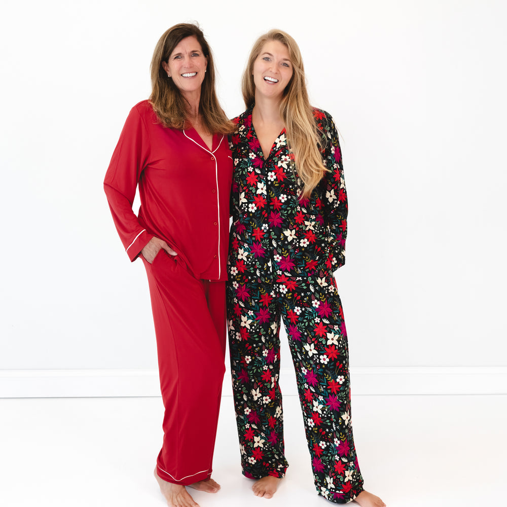 Female model on the left is in the Holiday Red Women's Long Sleeve Pajama Set and female model on the right is in the Berry Merry Women's Long Sleeve Pajama Set