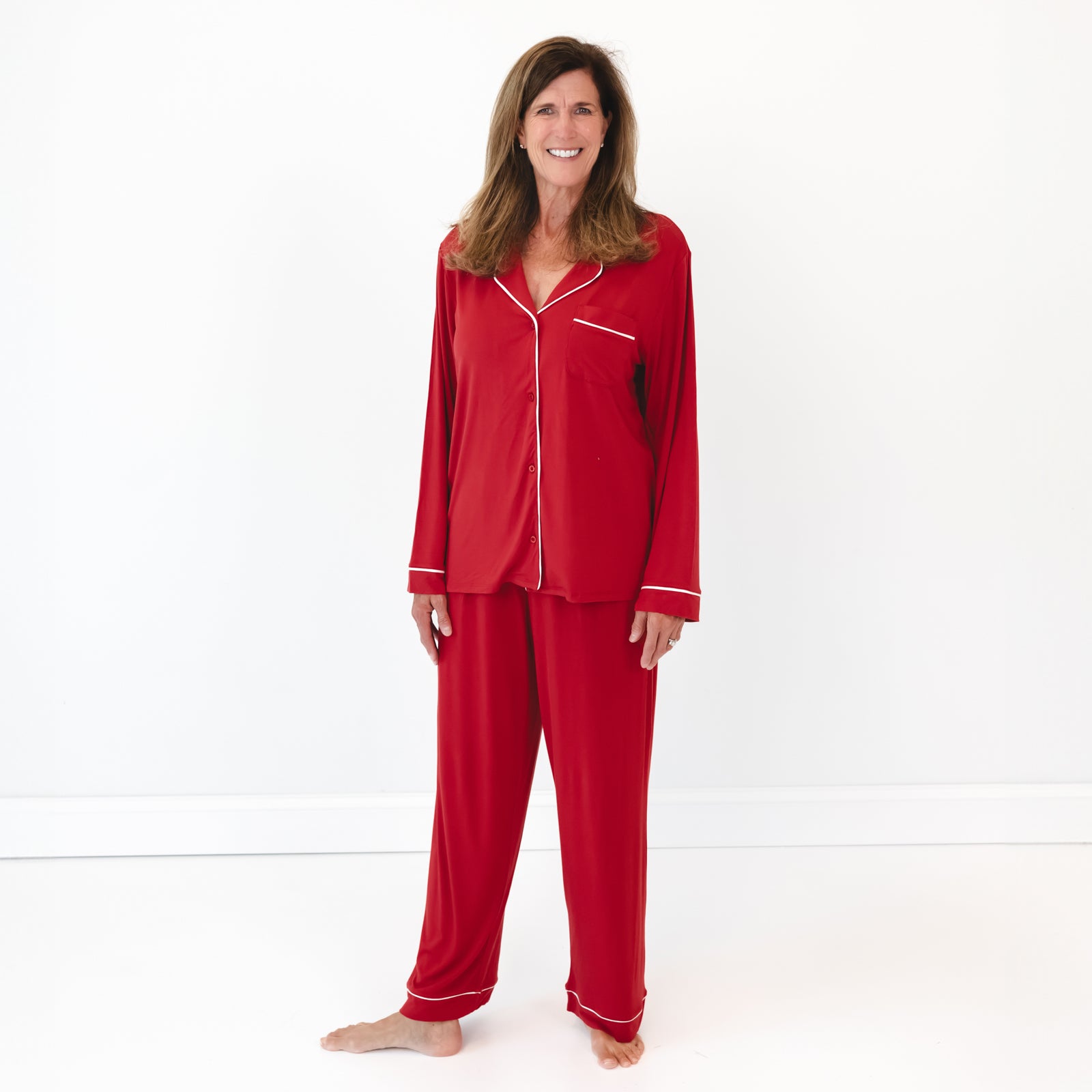 Female model is wearing the Holiday Red Women's Long Sleeve Pajama Set