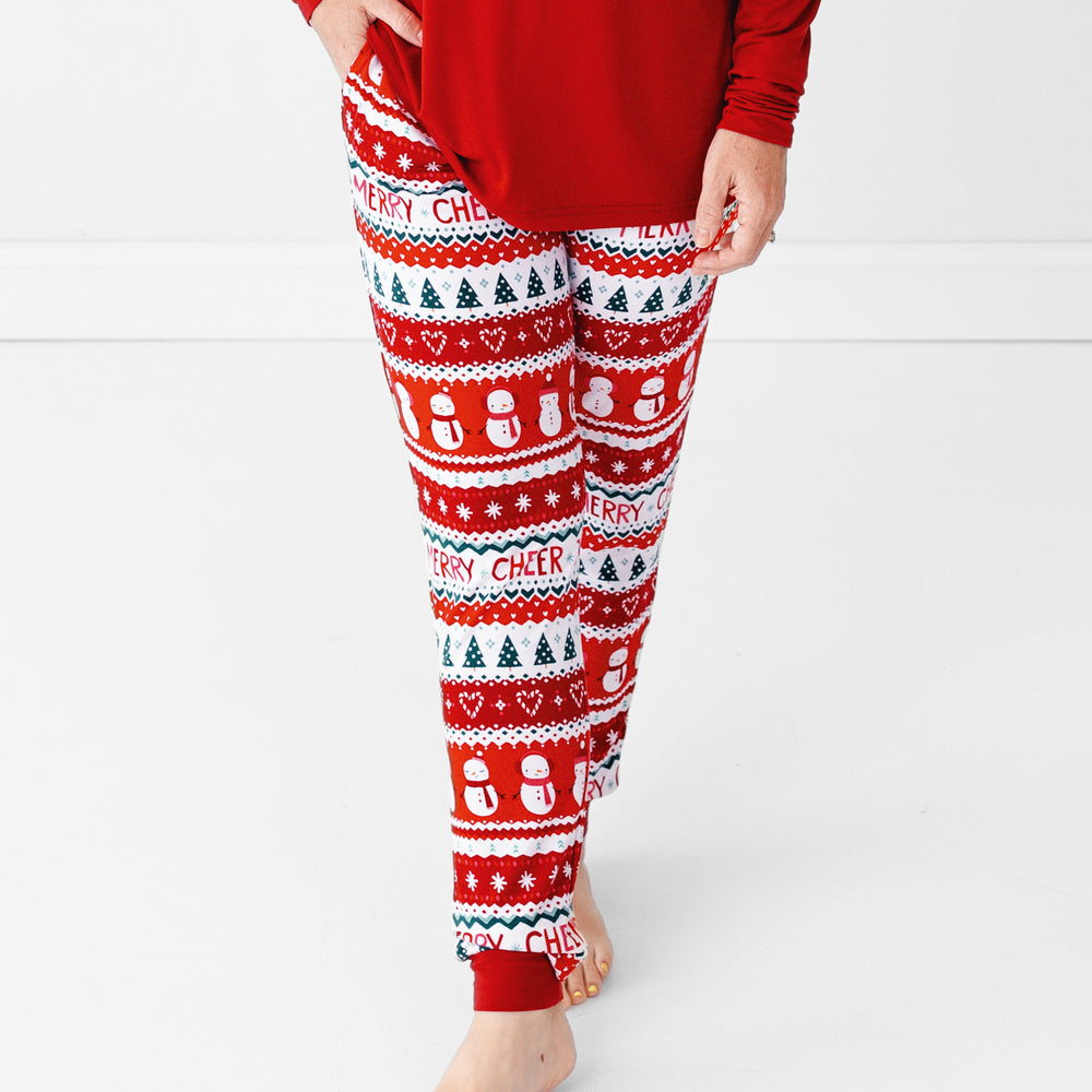 Close up image of a woman wearing Festive Fair Isle Women's Pajama Pants and coordinating Pajama Top