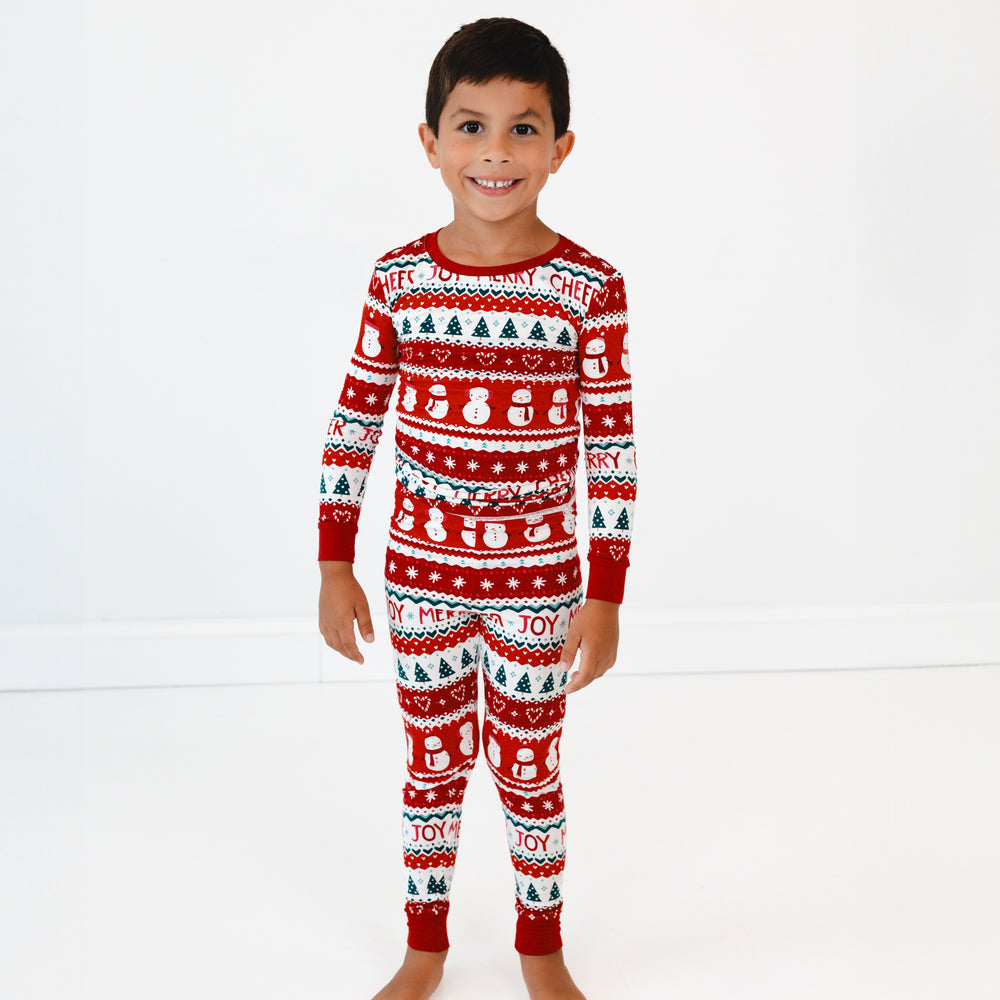 Child wearing a Festive Fair Isle Two-Piece Pajama Set