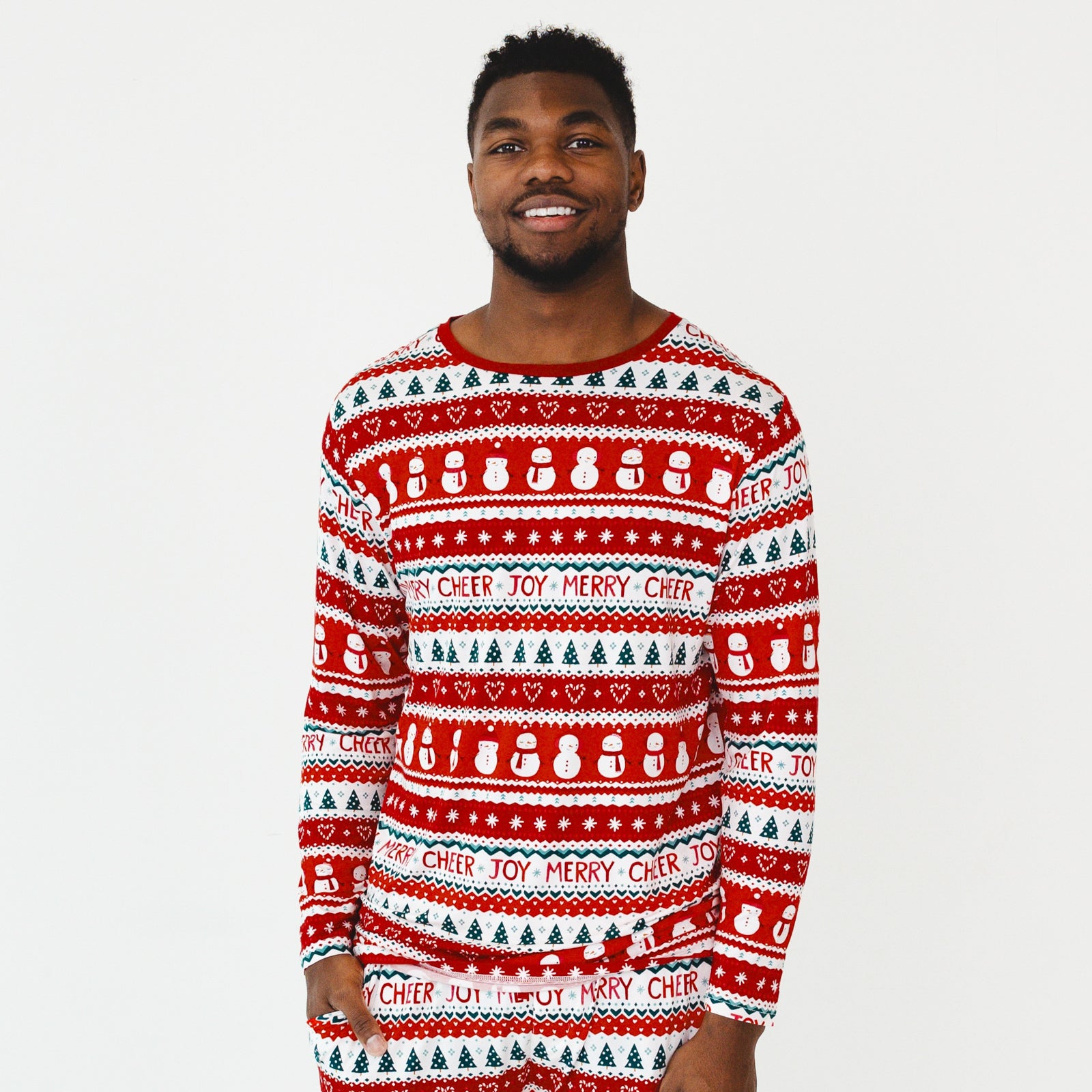 Close up image of a man wearing a Festive Fair Isle Men's Pajama Top and matching Pajama Pants