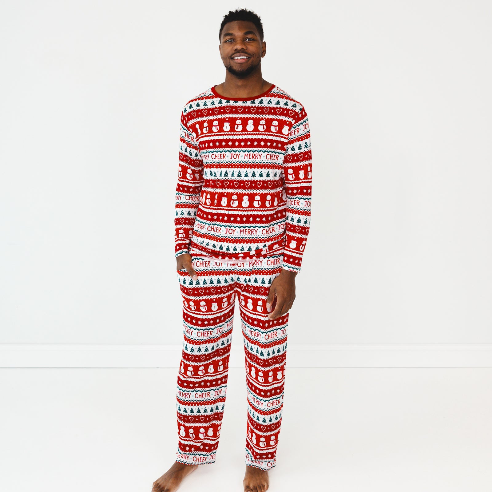 Image of a man wearing Festive Fair Isle Men's Pajama Pants and matching Pajama Top