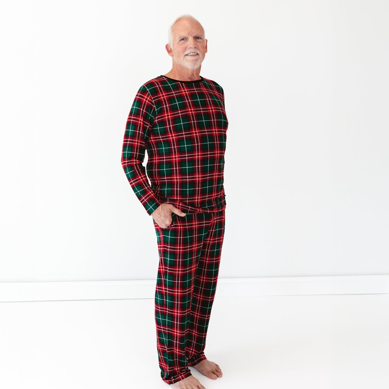 Man wearing Fireside Plaid Men's Pajama Pants and Pajama Top