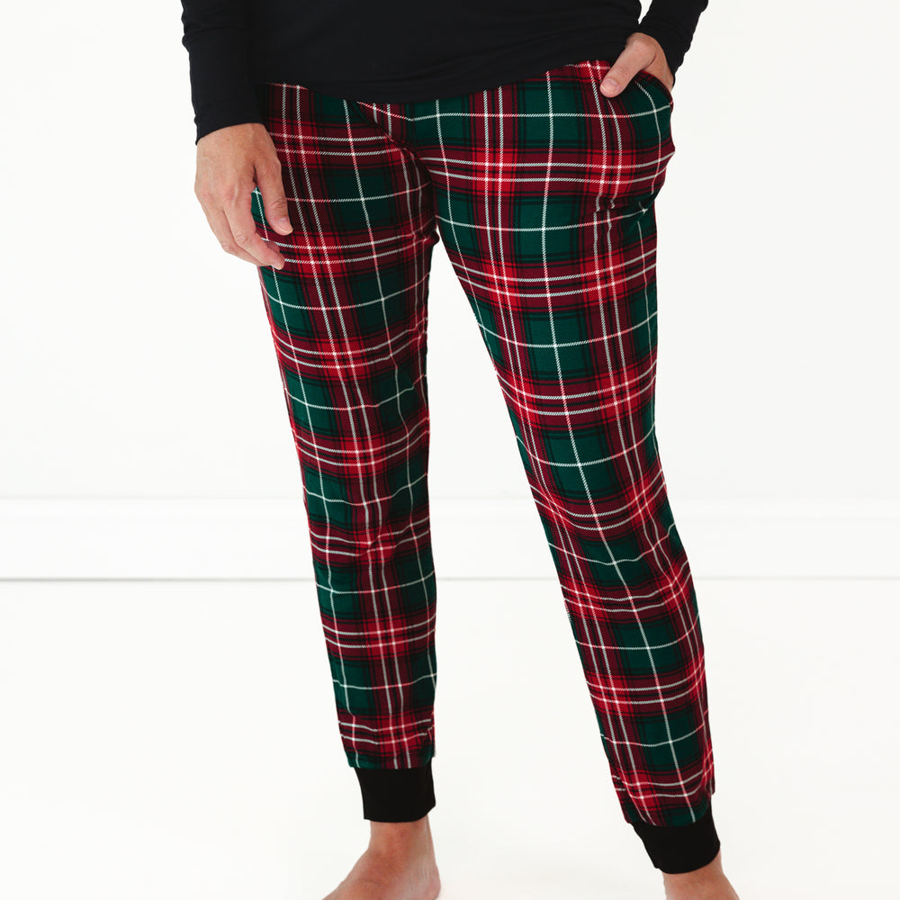 Close up image of a woman wearing Fireside Plaid Women's Pajama Pants and coordinating Pajama Top