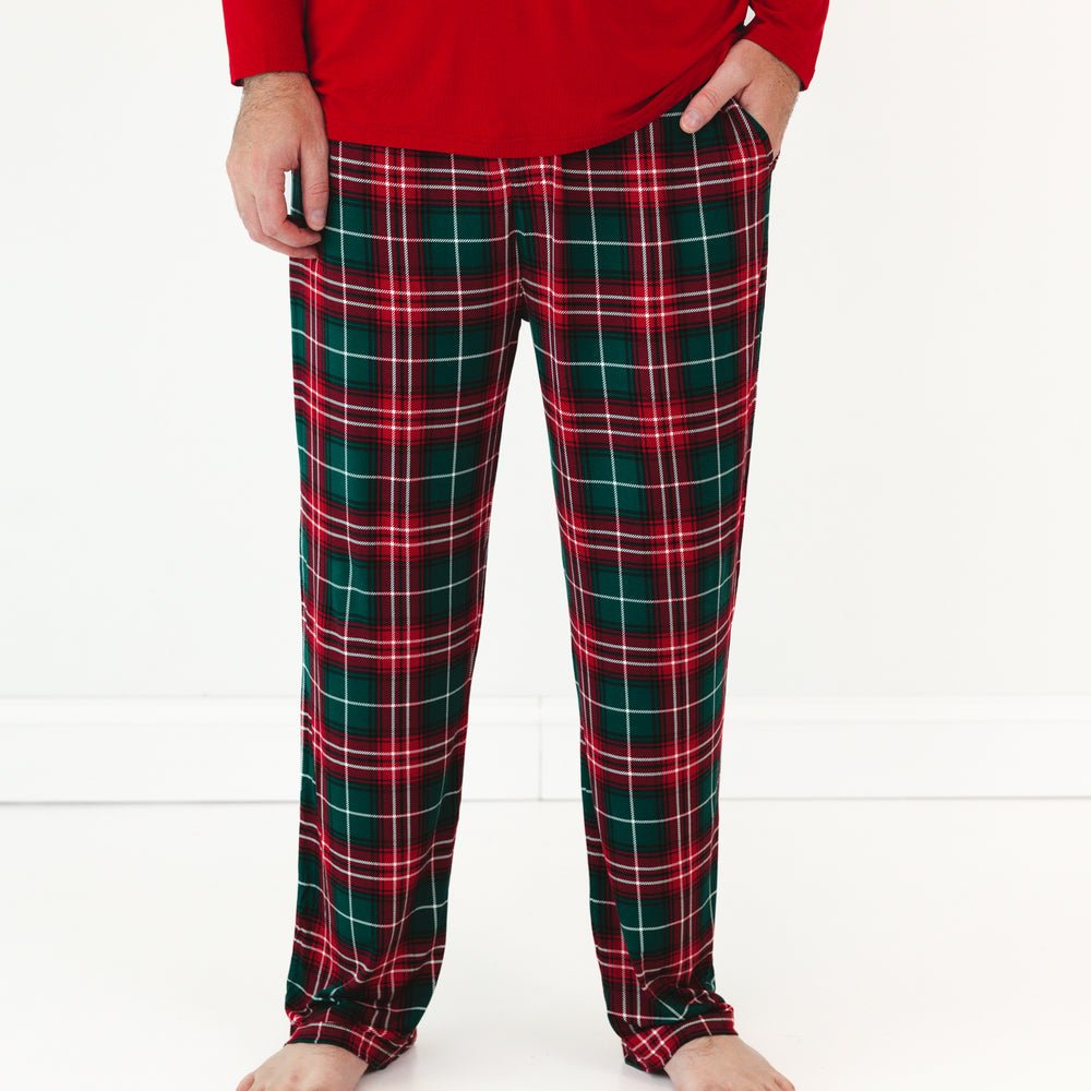 Close up image of a man wearing Fireside Plaid Men's Pajama Pants and coordinating Pajama Top