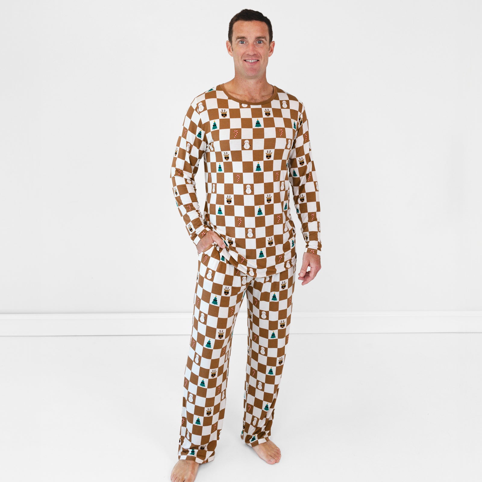 Male model wearing the Holiday Checks Men's Pajama Pants and Top