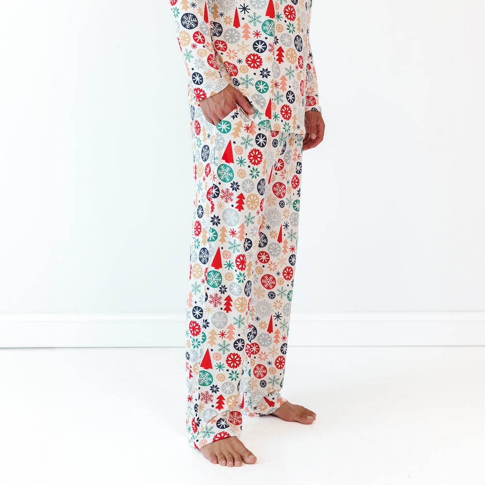 Side view image of the Modern & Merry Men's Pajama Pants while displaying the pocket detail