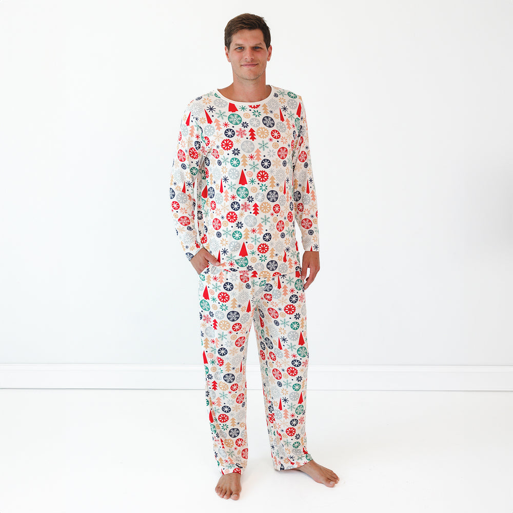 Male model wearing the Modern & Merry Men's Pajama Pants and Top