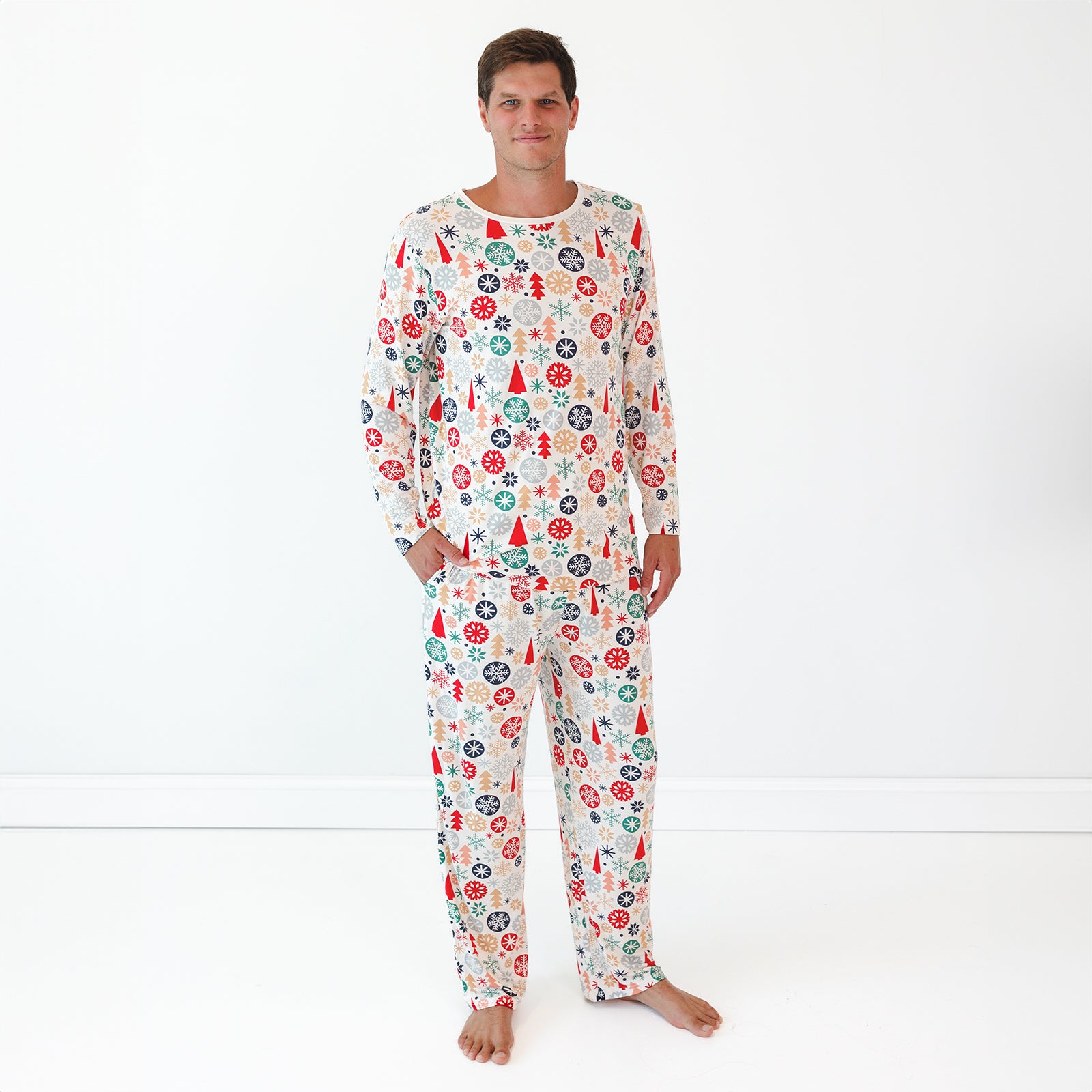 Male model wearing the Modern & Merry Men's Pajama Top and Pants