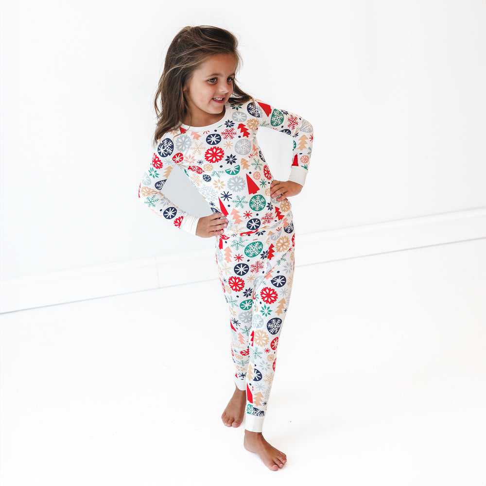 Girl posing while wearing the Modern & Merry Two-Piece Pajama Set