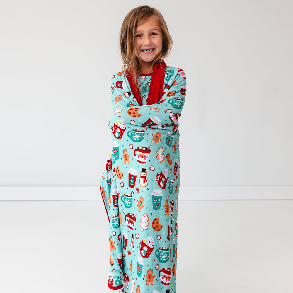 Child wrapped up in a Peppermint Mocha Large Cloud Blanket