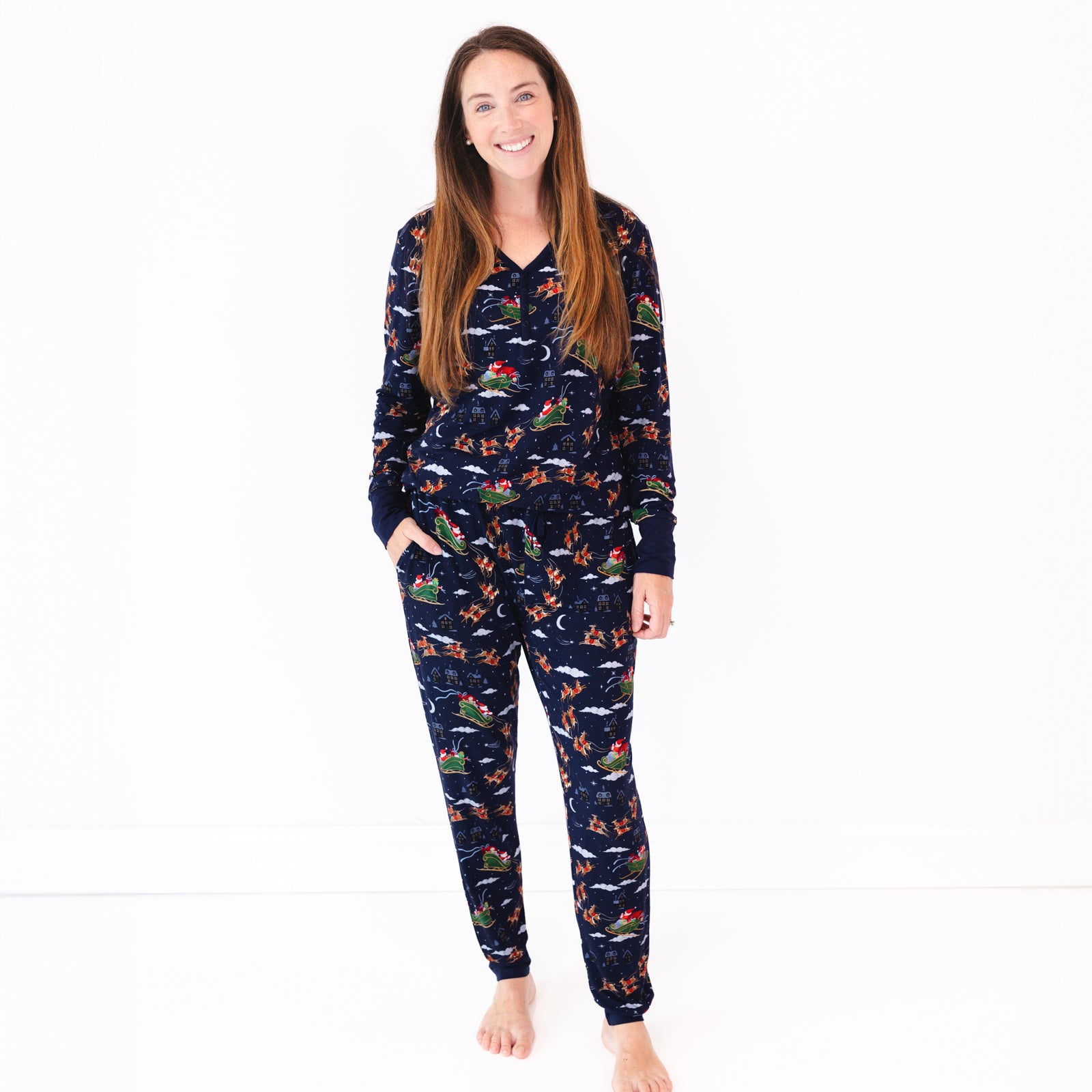 Image of a woman wearing Santa's Sleigh Women's Pajama Pants and Top