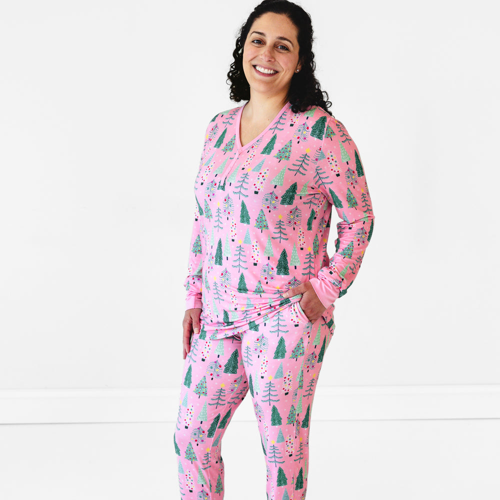 Image of a woman wearing Pink Twinkling Trees Pajama Pants and matching Pajama Top