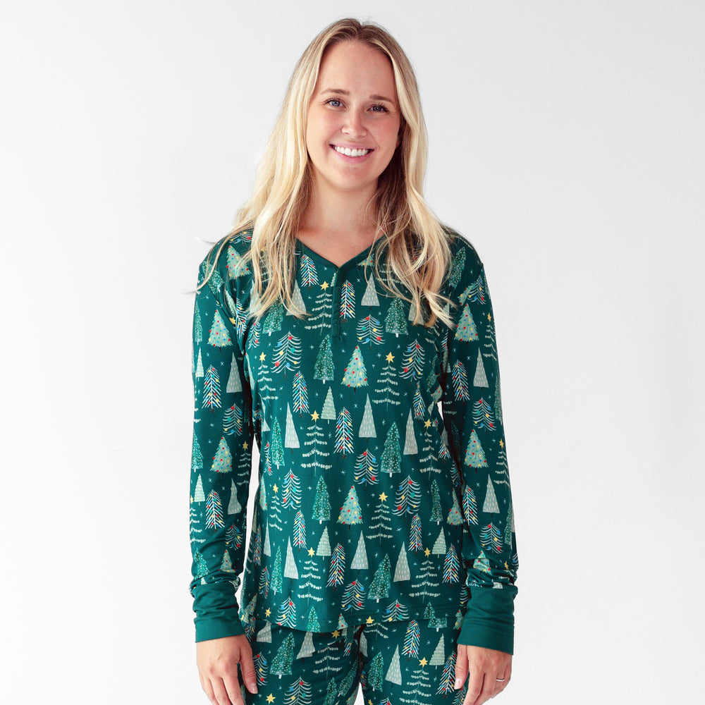 Close up image of female model wearing the Green Twinkling Trees Women's Pajama Top