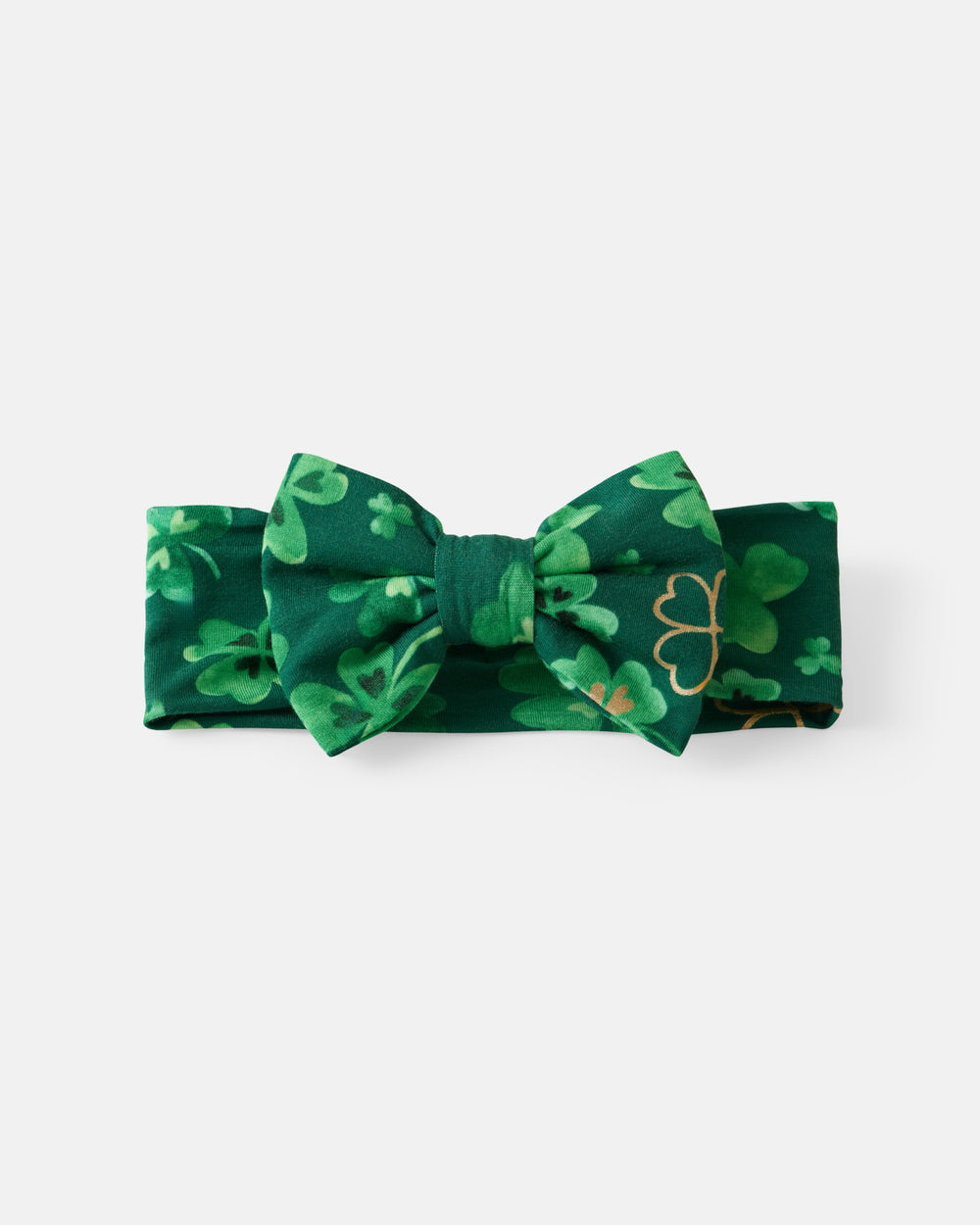 Flat lay of the Clover Cuties Luxe Bow Headband