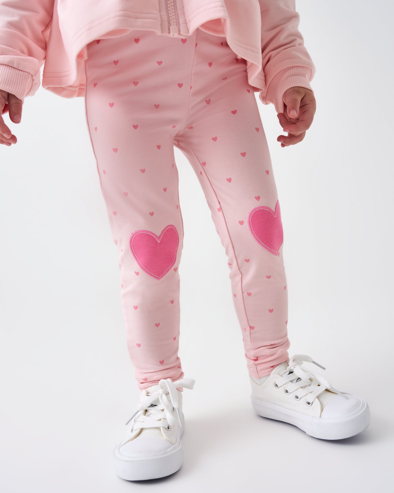 Child wearing the Little Love Heart Patch Legging