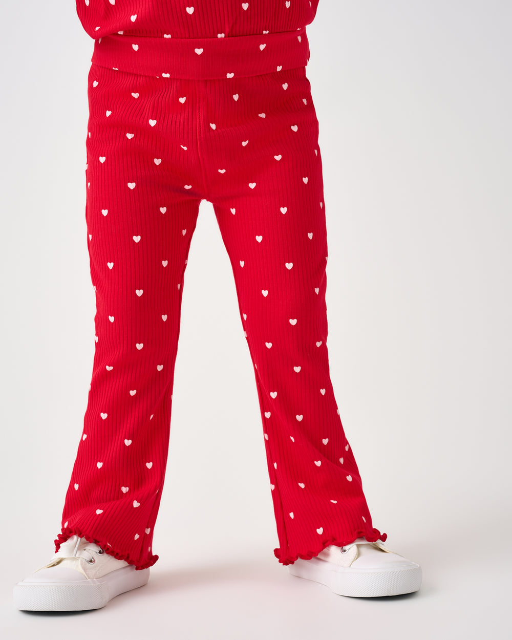 Close up of girl wearing the Little Love Ribbed Flare Pant