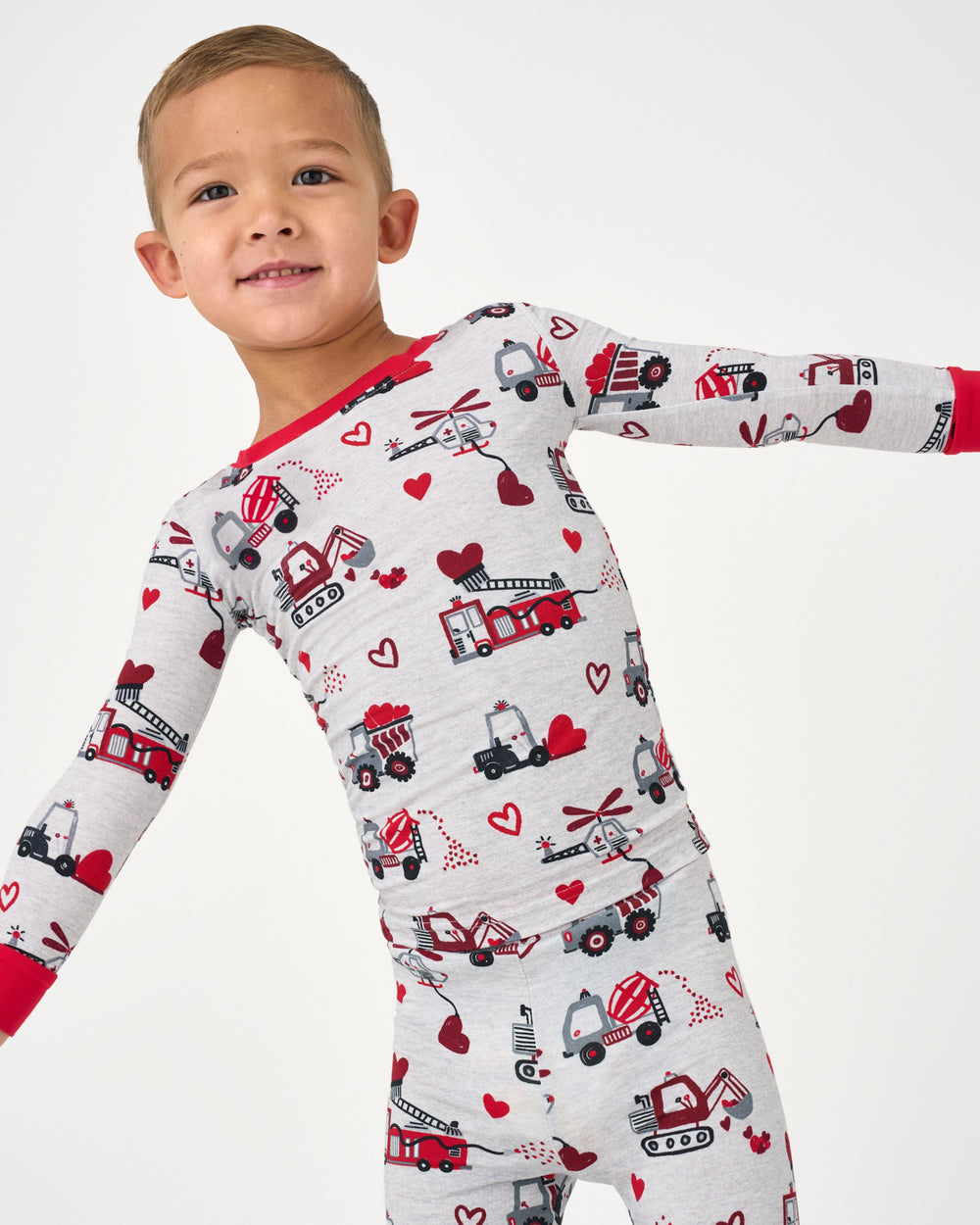 Close up of boy wearing the Loads of Love Two-Piece Pajama Set