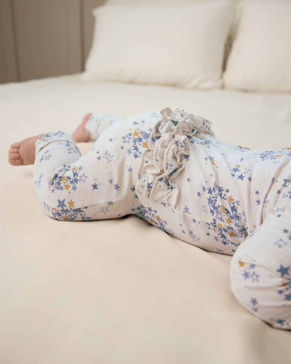 Close up of the ruffle detail on the Lullaby Sky Ruffle Zippy