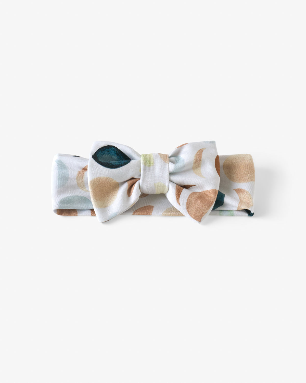 Flat lay of the Luna Neutral Luxe Bow Headband