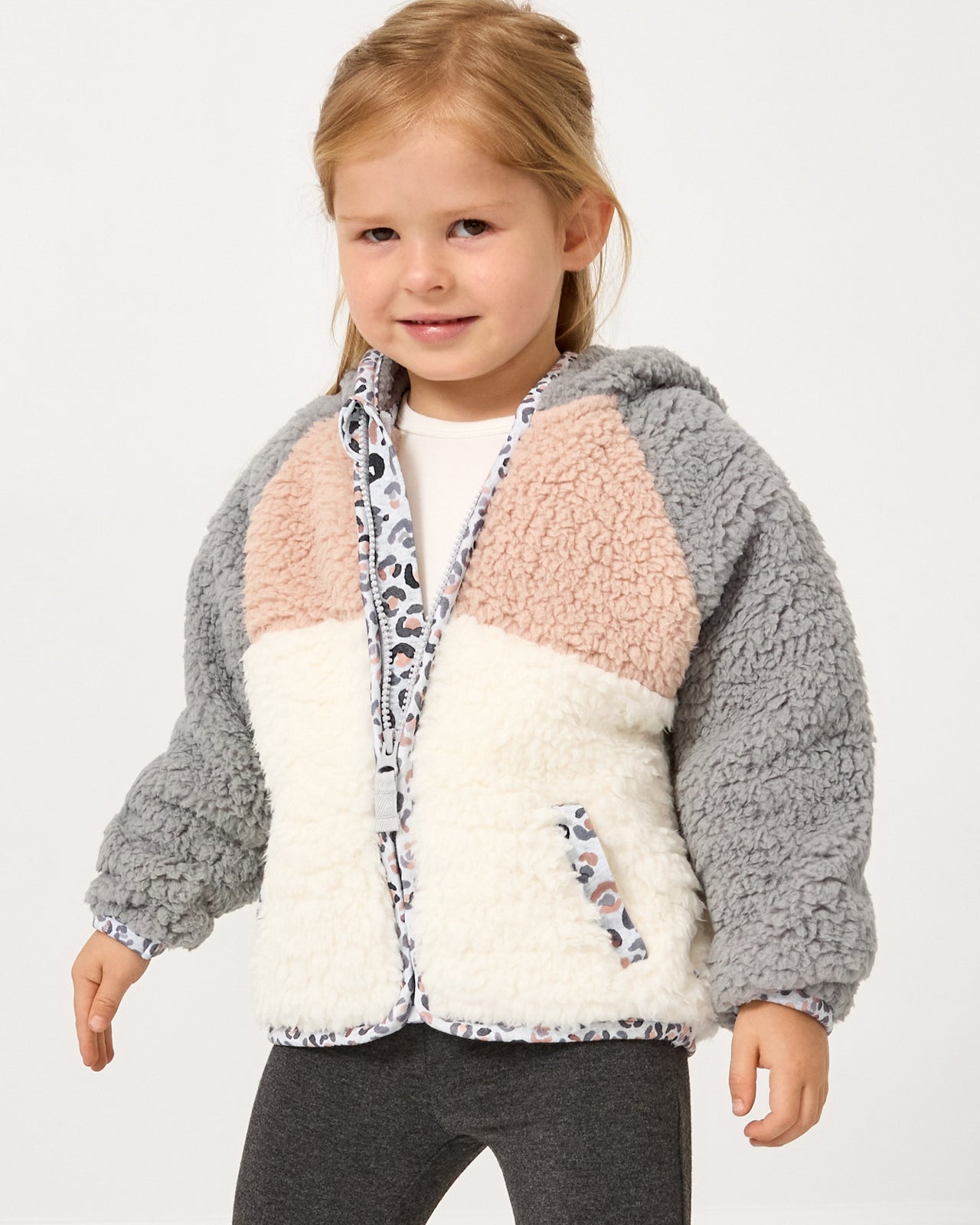 Girl wearing the Morning Fog Sherpa Jacket