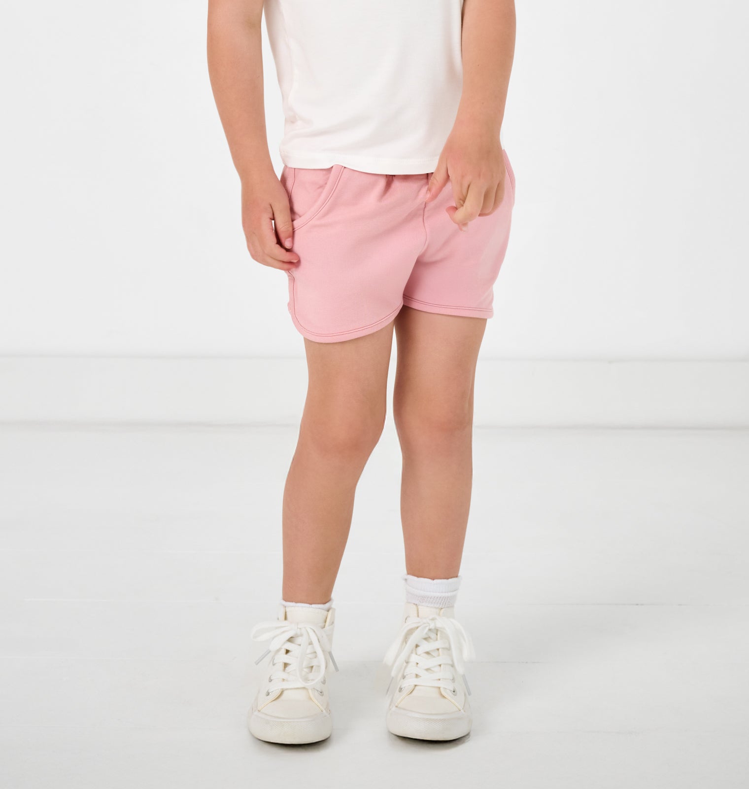 Girl wearing the Mauve Blush Dolphin Shorts