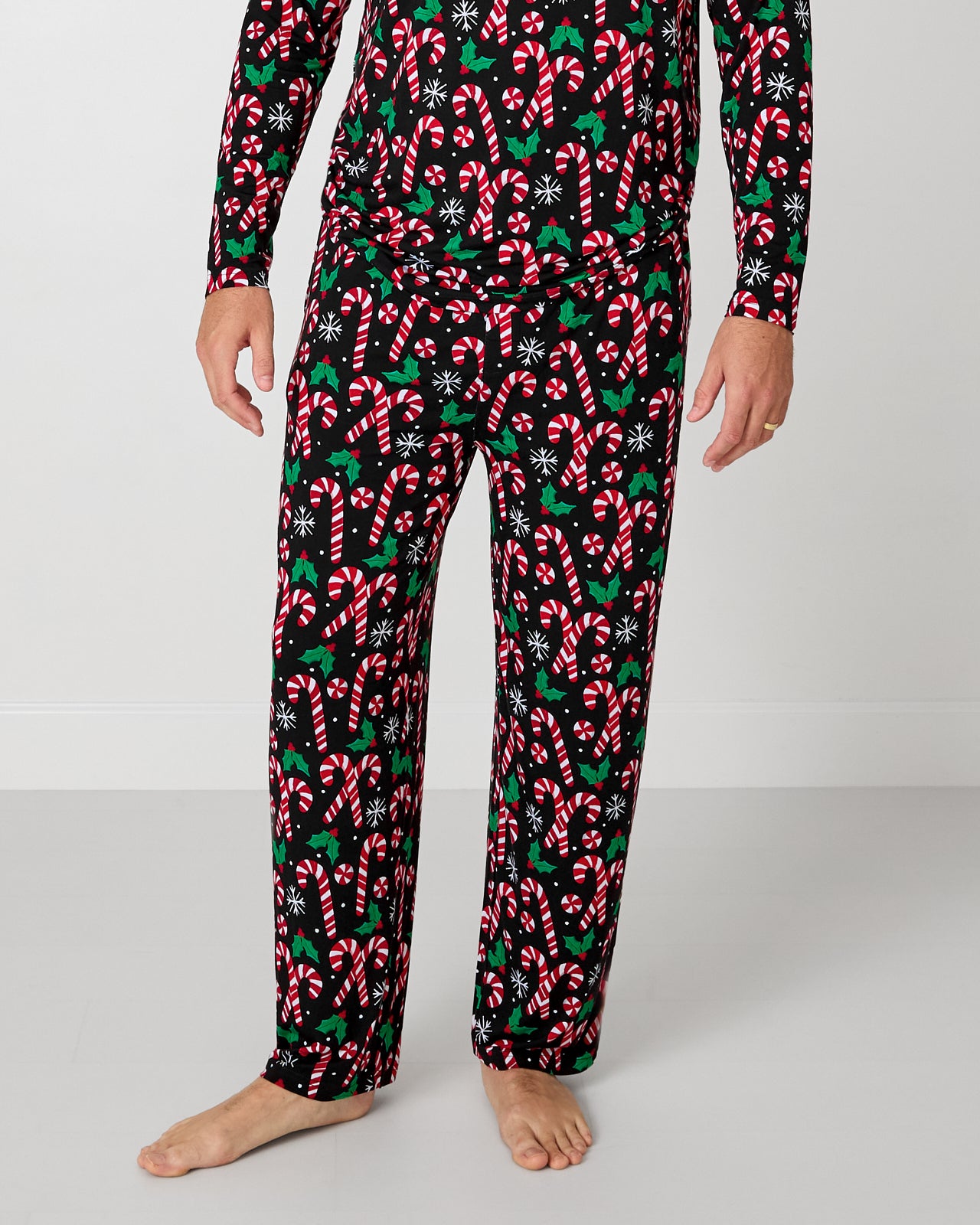 Man wearing the Merry Mints Men's Pajama Pants
