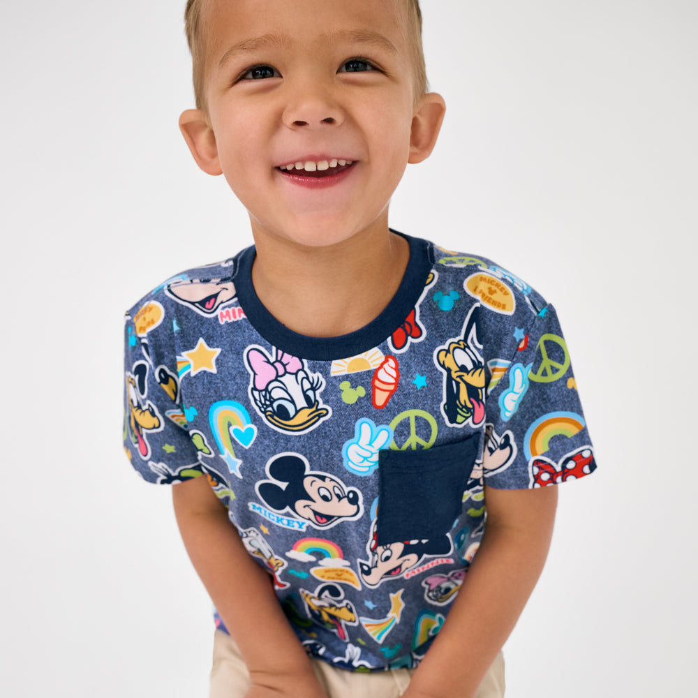 Close up of boy wearing the Disney Mickey's Clubhouse Relaxed Pocket Tee