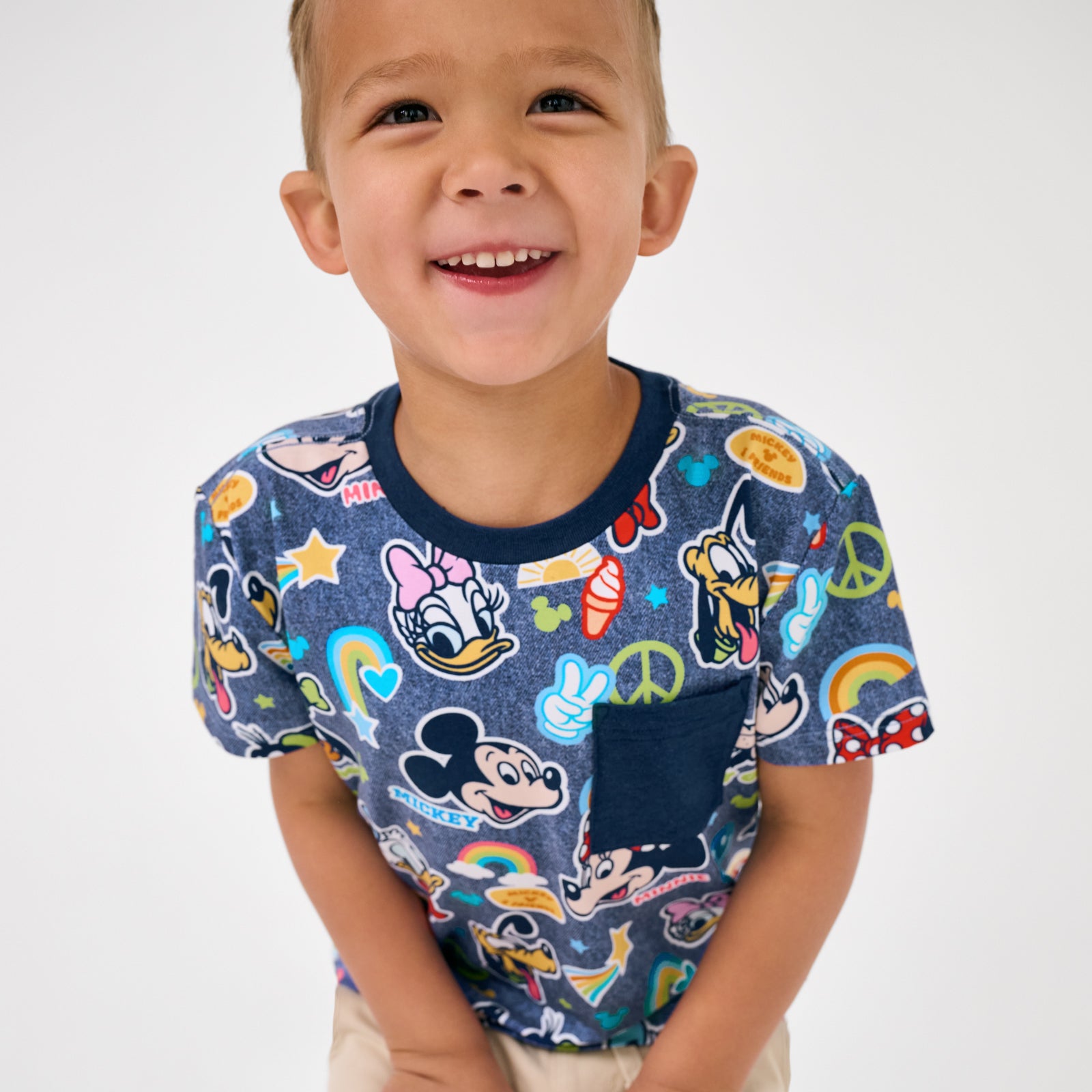 Close up of boy wearing the Disney Mickey's Clubhouse Relaxed Pocket Tee