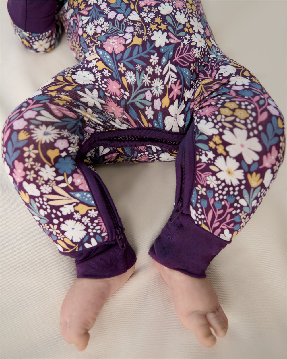 Close up of the zipper detail on the Midnight Petals Crescent Zippy