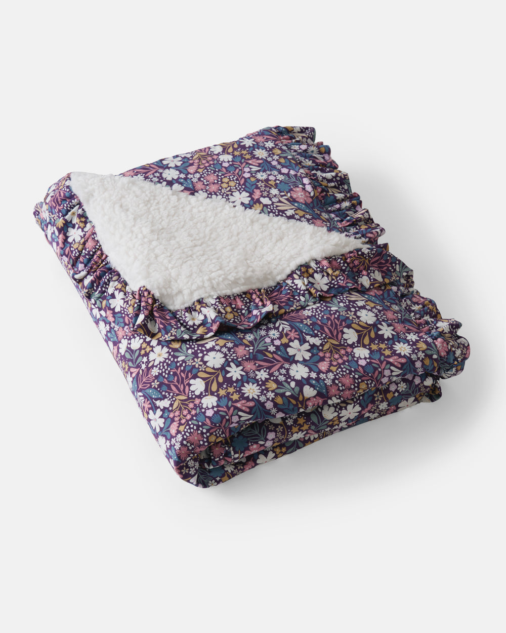 Flat lay of the Midnight Petals Ruffle Mini Cloud Blanket®