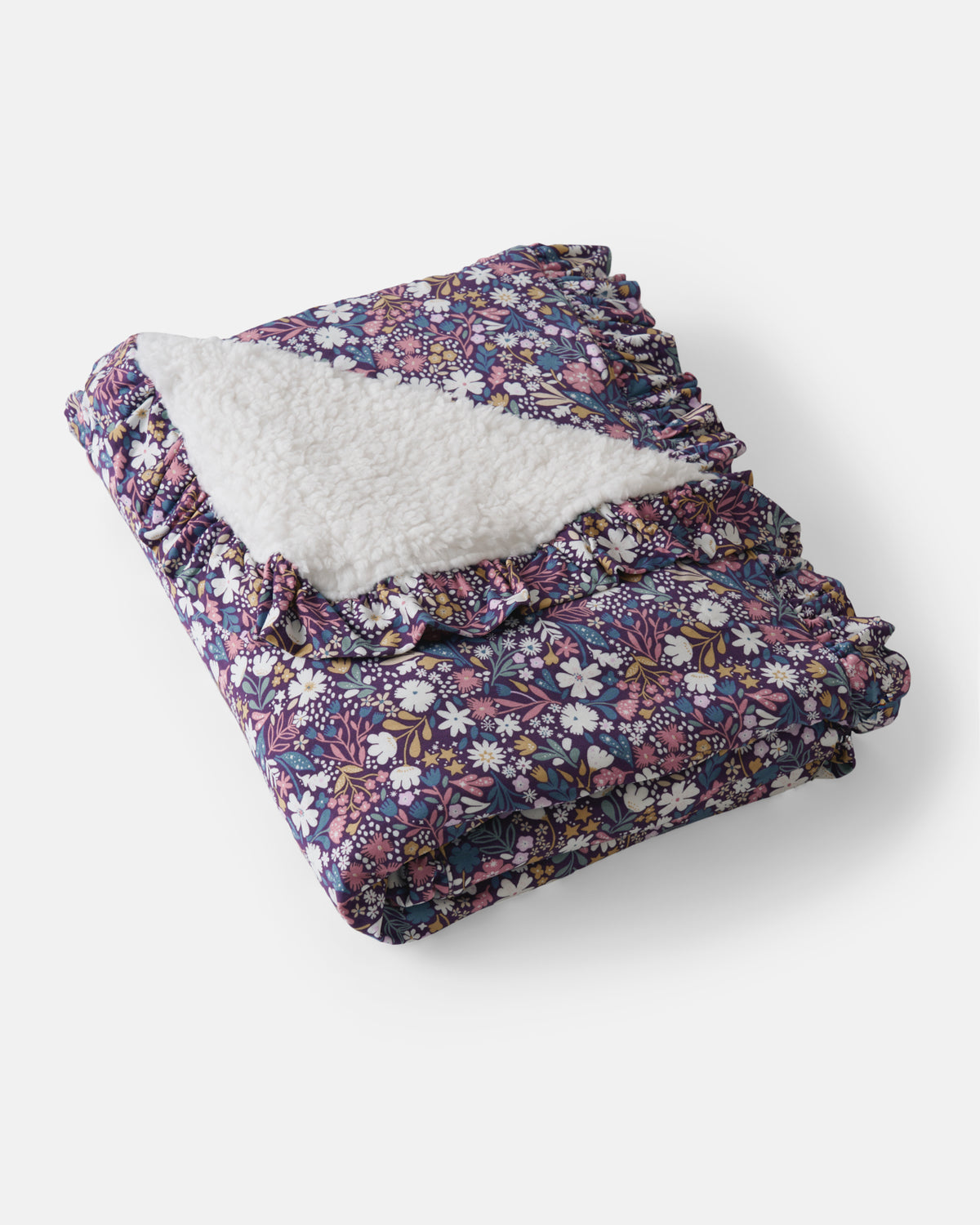 Flat lay of the Midnight Petals Ruffle Mini Cloud Blanket®