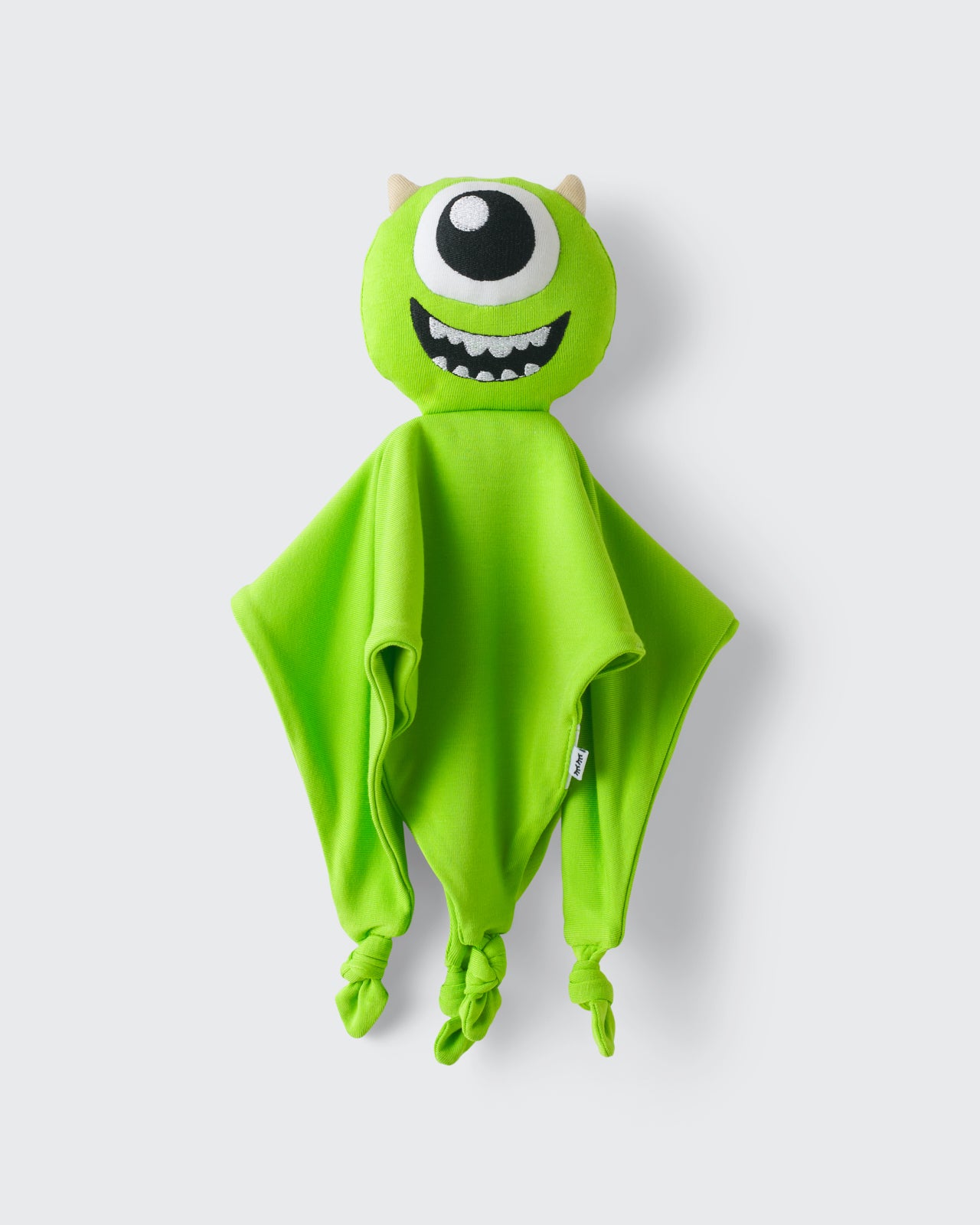Flat lay of the Disney Monsters, Inc. Mike Wazowski Lovey