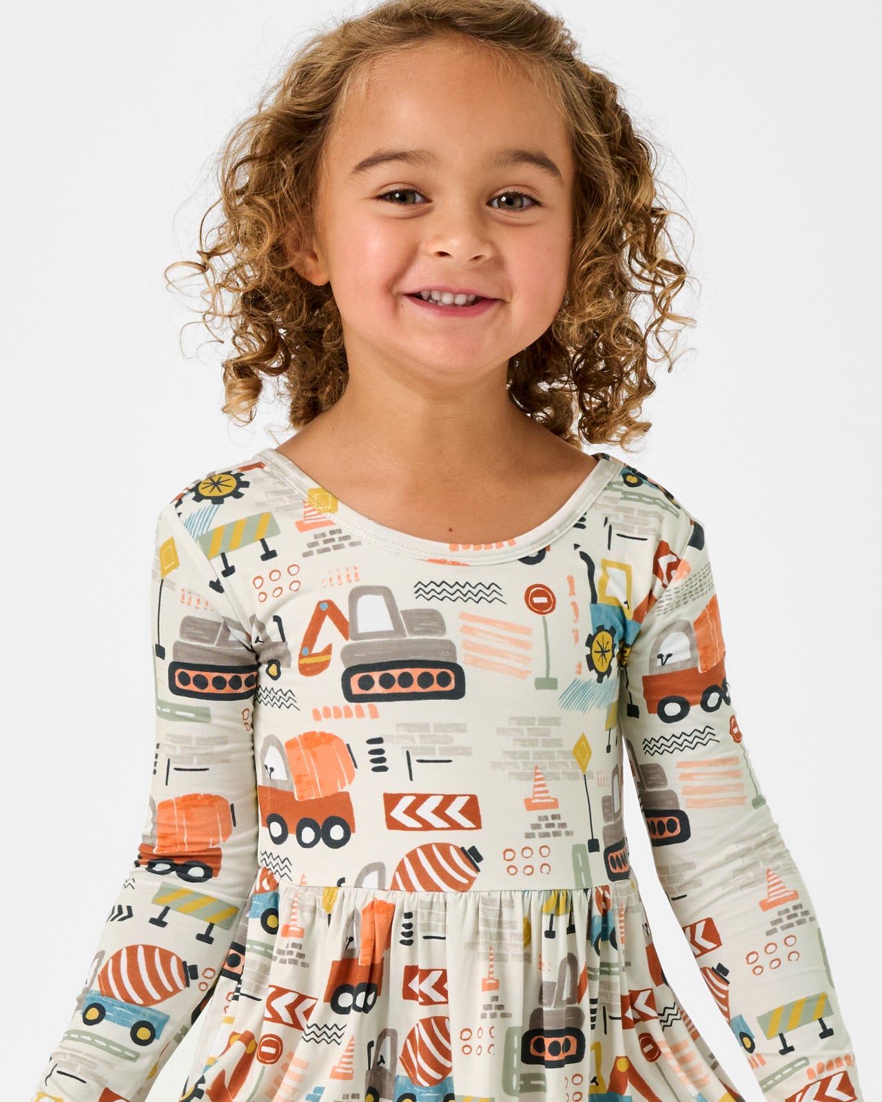 Close up of girl wearing the Mini Builders Skater Dress